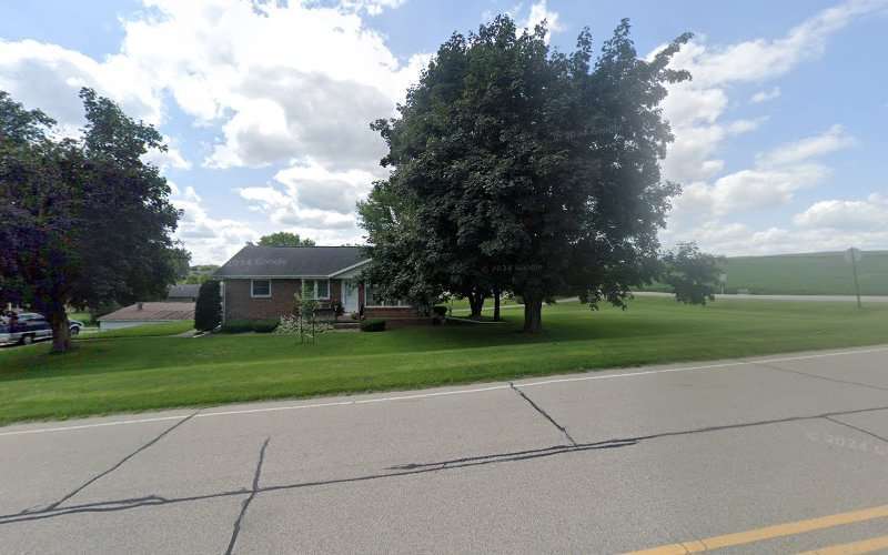 Ivan Kurt Auctioneer & Realty